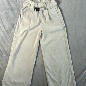 women's corduroy wide-leg culotte trousers in a light beige or cream color